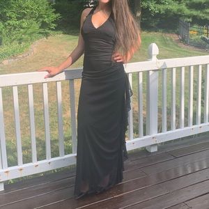 Black ruffle halter gown with faint glittery shine